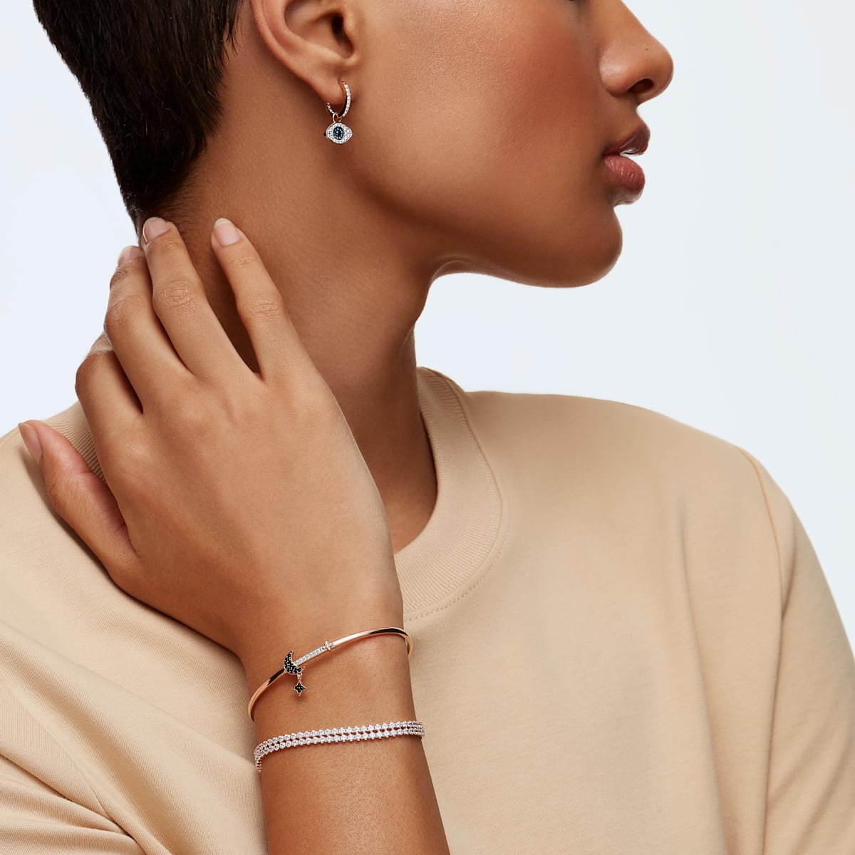 Swarovski - Swarovski Symbolic Ohrringe, Böser Blick, Blau, Rosegold-Legierungsschicht - CRYSTAL UNTERBERGER