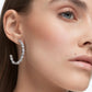 Swarovski - Tennis Deluxe Kreolen, Kristalle in einem Mix aus Schliffen, Weiss, Rhodiniert - CRYSTAL UNTERBERGER
